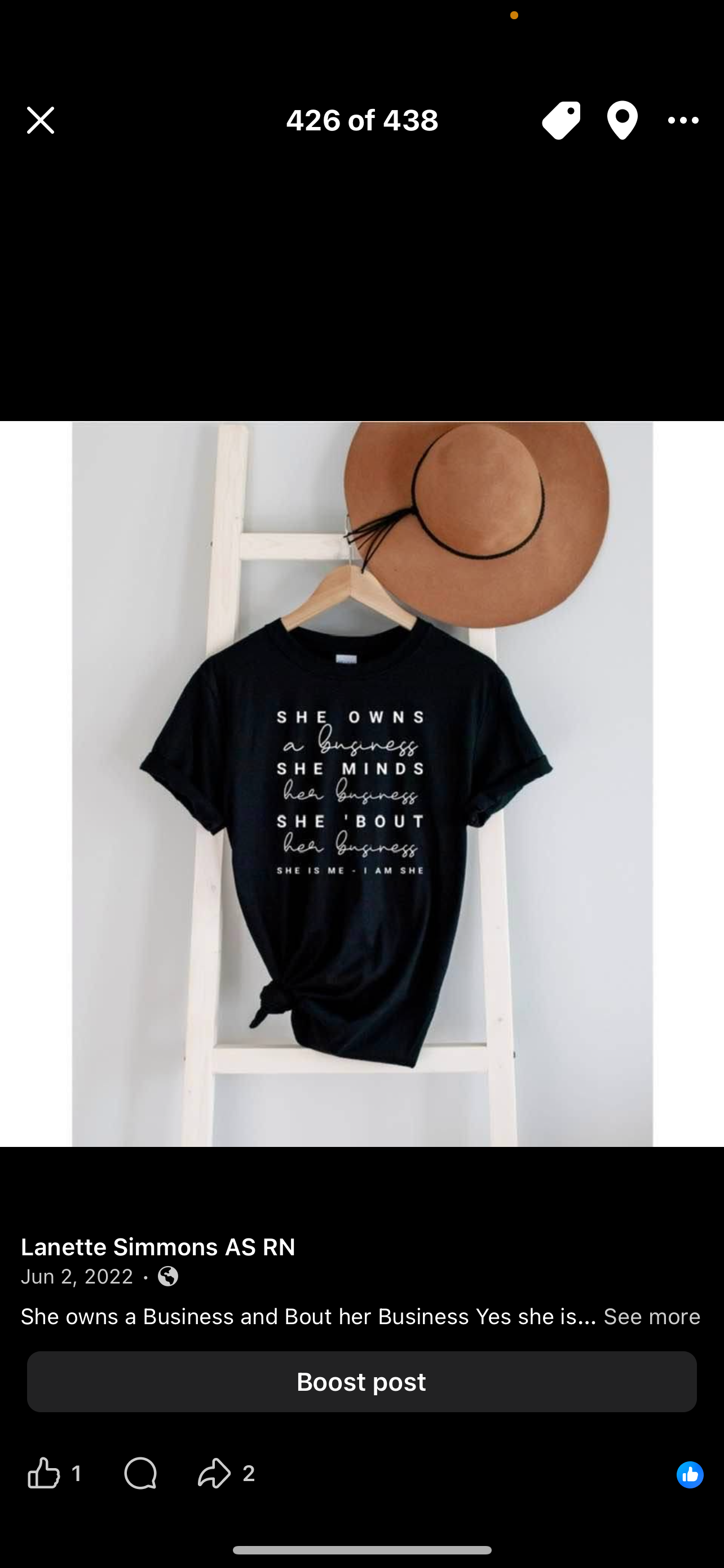 She owns a Business T- shirt